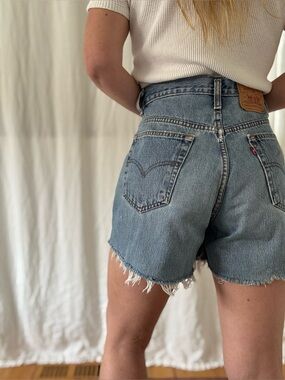 Vintage Levi’s 535 cut off jean shorts 90s stonewash